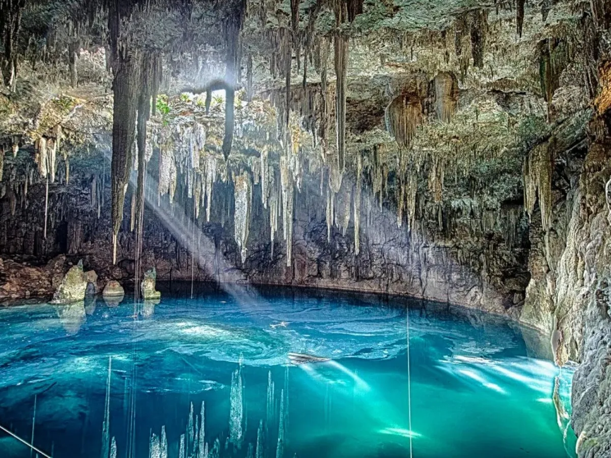Ruta de los Cenotes — sunlit underground cenote near Puerto Morelos