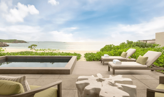 Wellness experiences at Rosewood Miyakojima, featuring Okinawan-inspired spa therapies, karate lessons with a local sensei, and guided coral reef snorkeling tours for marine conservation awareness.