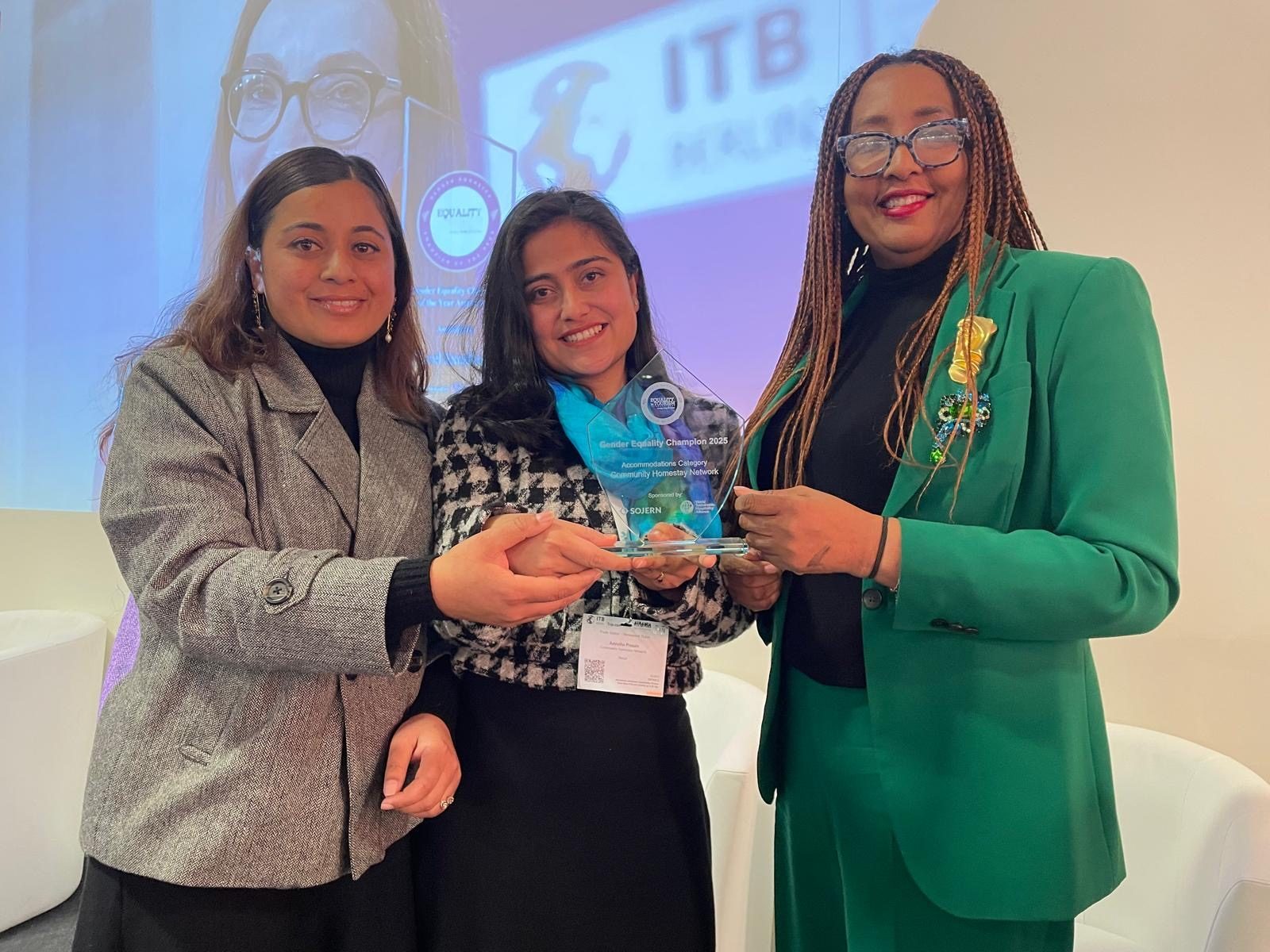 Representatives of the Community Homestay Network, Nepal, receiving the Accommodation Winner award at the 2023 Gender Equality Champion event. The award recognizes their efforts in promoting gender inclusion, empowering female entrepreneurs, addressing climate risk, and preserving cultural heritage through women-run homestays.
